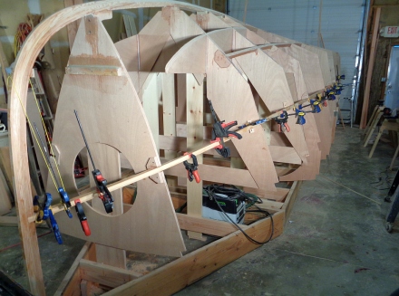Start of the stringer lamination -- more clamps to come