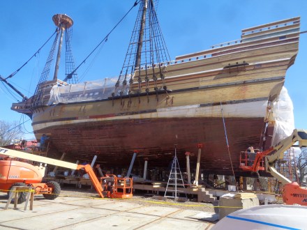 Mystic crew is rushing to get the Mayflower into the water for the summer tourist season.  So scads of workers on cherrypickers are the order of the day.