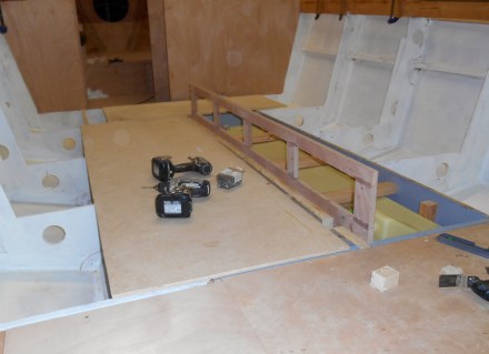 Framing for dinette -- drawers under the raised dinette floor.