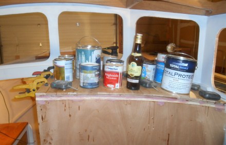 Dash sheathing weighted into expoxy with paint cans, lead weights and other heavy liquids.