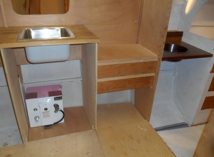 Galley drawers for cutlery and utensils.