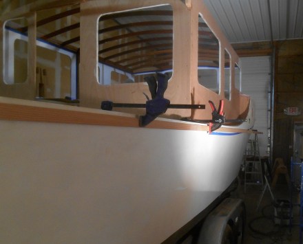 Rubrail clamped and tied to the boat.