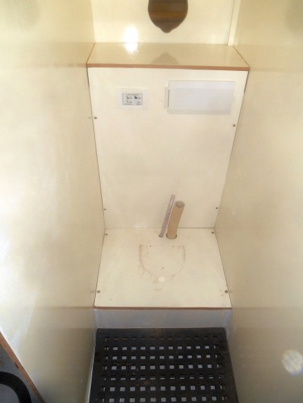 Head ready for the Device on the left is the toilet flush mechanism. Box on the right is the shower. I'll show you how it works when the head is in.