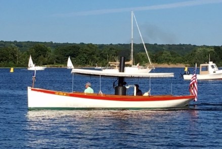 From my other life, that's me in the green shirt driving the 116-year-old steam launch Osprey in front of the Conneticut River Museum.