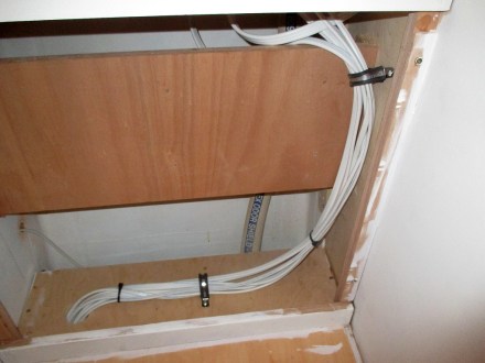 Port side wiring under the panel is starting to straighten itself out.