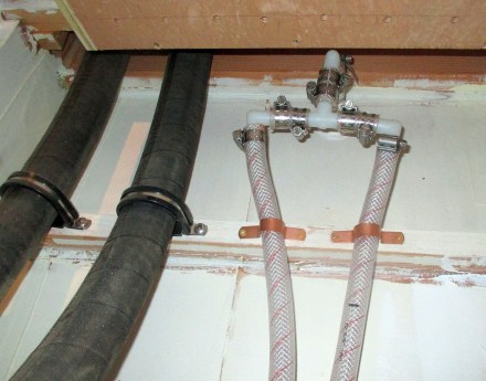 Installing the water tank vents up underneath the microwave cabinet left me with very little skin on my knuckles.