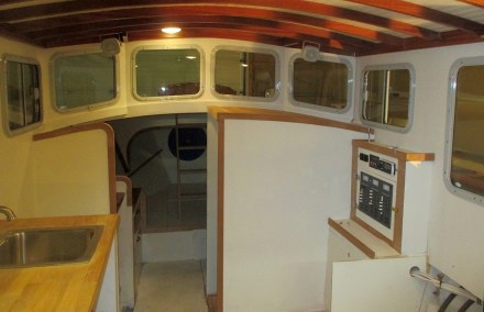 Forward toward the windshield